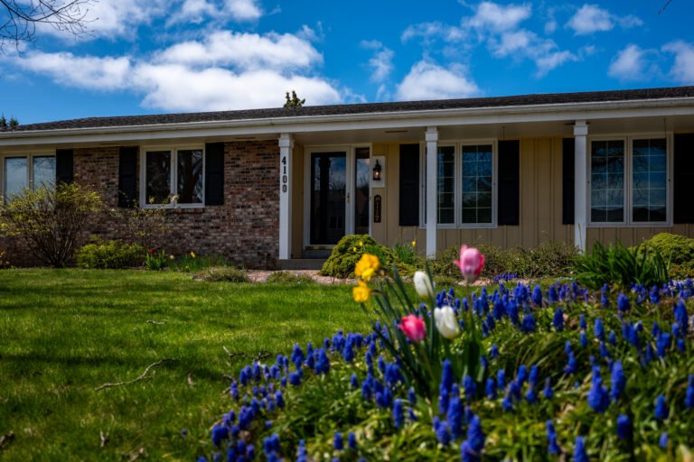 Real estate photo exterior with landscaping
